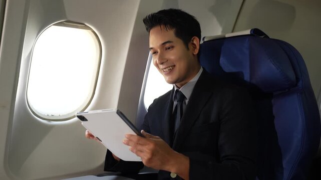 Email notification concept, Male use Tablet and laptop receive message alert in the mailbox on the plane.