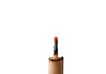 Recently extinguished candle wick, blackened, with an orange-red ember & curling white smoke, isolated on a transparent background with no shadows. Concept of quiet finality
