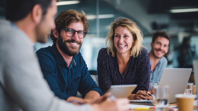 Enthusiastic Work Team. Diverse Colleagues Using Laptop and Tablet in Office Meeting