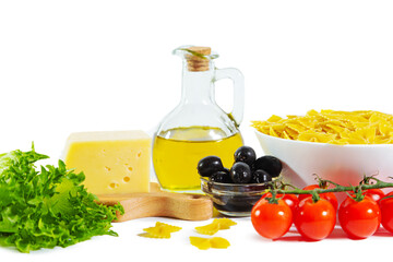 Ripe juicy vegetables, farfalle pasta, cheese, olive oil. Ingredients of Italian cuisine.