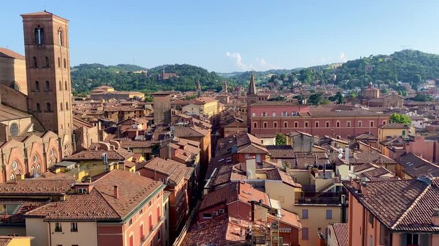 Bologna, Italy. View of the old town from above. Rooftops and streets, hills in the background. Videos.