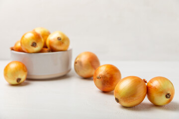 Onion on the kitchen table. onion slice. onion rings. Fresh Yellow Onion. Natural, fresh, vegetarian food. Agricultural products. Healthy eating. Vegetables. Farmer's market. Space for text.Copy space