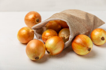 Onion on the kitchen table. onion slice. onion rings. Fresh Yellow Onion. Natural, fresh, vegetarian food. Agricultural products. Healthy eating. Vegetables. Farmer's market. Space for text.Copy space