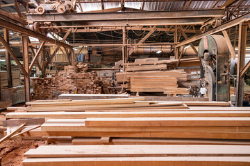 Dusty traditional wood workshop with sawdust pile