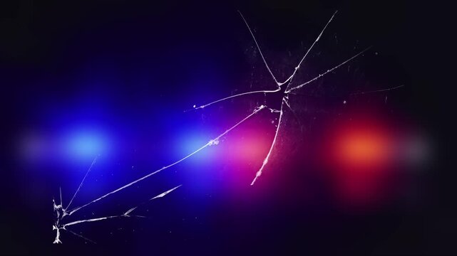 Cracked glass with flashing red and blue emergency lights. Shattered glass with pulsating red and blue emergency lights. Abstract background for crime, emergency, danger, security concept