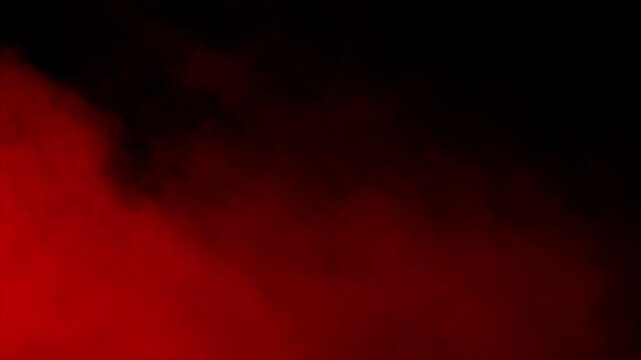 Red mist and blood swirls and flows slowly on a black background. Ideal overlay for bloody horror films, dramatic intros, atmosphere of danger or passion
