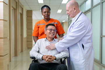 Doctor and nurse supporting happy recovering patient