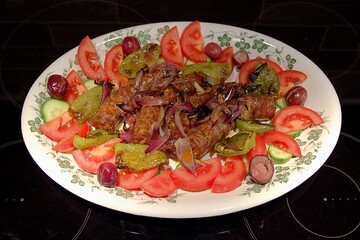 Grilled Sausage with Peppers and Onions on a Platter