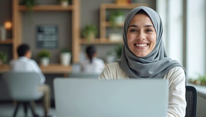 Smiling Arabic teacher in hijab leads online class. Engaged multicultural students learn via e-learning platform. Modern education focused on pedagogy, diverse cultures promotes global knowledge