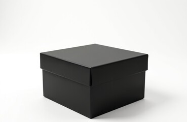 Naklejka premium Plain black gift box with lid on white background. Square cardboard container, suitable for luxury jewelry, watches accessories. Modern, elegant packaging design for birthdays, celebrations, special