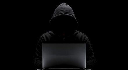 Anonymous hacker using laptop in darkness, cyber security threat concept, online fraud, internet crime