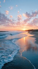 Sunset Beach Scene with Pink Clouds and Calm Waves