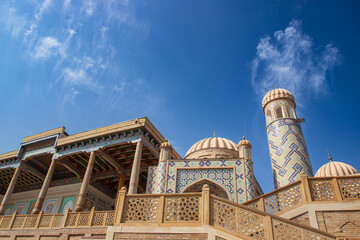 View on Hazrat Khizr Mosque against blue sky in Samarkand, Uzbekistan. The building and minaret of...
