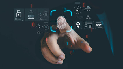 A man in a suit touches a futuristic interface, scanning his fingerprint for biometric authentication. This action grants access to a secure system for data protection and cybersecurity.