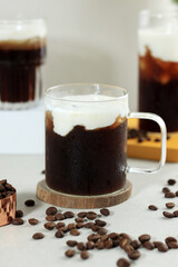 Espresso with ICe Cubed and Creamy Milky Soft Foam on Top Like Cloud