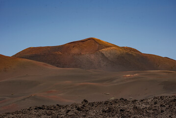 Volcanic landscape dominating canary islands scenery in lanzarote, spain