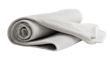 Rolled light gray blanket