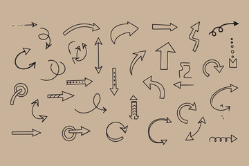 Hand drawn arrow collection doodle style on brown background