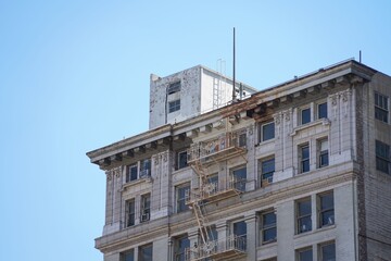 Historic building facade with fire escape.