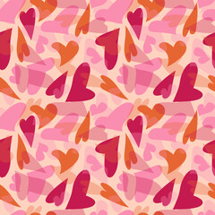 A seamless pattern with various hearts in shades of pink and red. This abstract and romantic background is perfect for Valentine's Day, weddings, greeting cards, textiles