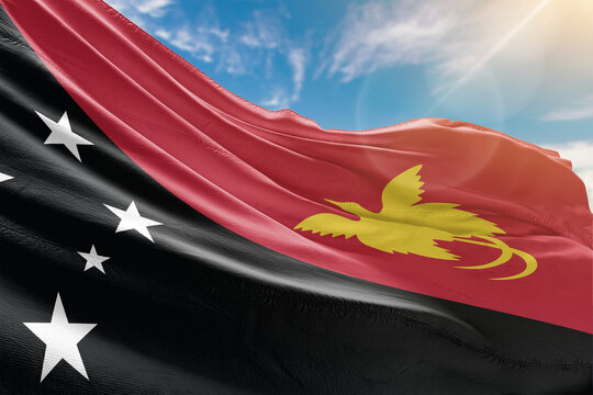 A colorful collage of world flags waving proudly under a bright blue sky, symbolizing unity, diversity, and global friendship.