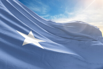 A collection of waving national flags under the blue sky, symbolizing unity, pride, and international identity
