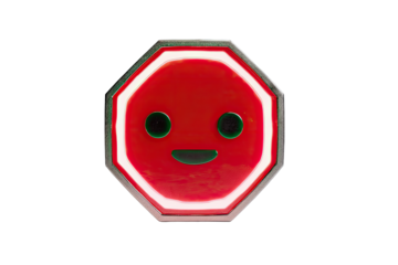 A red octagonal stop sign with a cartoon face