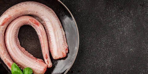 Raw rock eel fish rock salmon shark seafood small-spotted catshark tasty snack fresh delicious...
