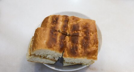 close up of Singaporean nanyang style kaya thick toast, with butter and pandan sauce in the middle for breakfast with copy space