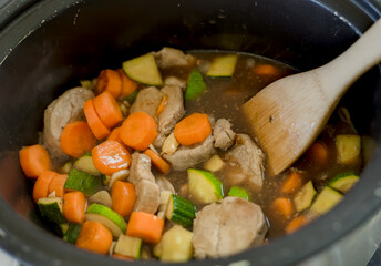Slow Cooker Stew with Pork, Carrots, and Zucchini in Dark Broth