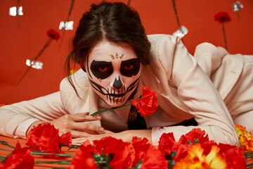 Woman honours heritage with a traditional look for Day of the Dead festivities in colors