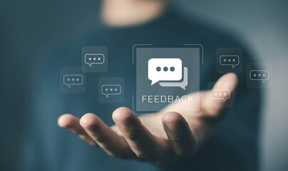 Feedback concept. chat bubble icon floating above hand, symbolizing customer opinions, review...