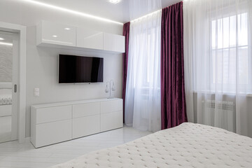 Modern Bright Bedroom with Stylish Decor and Window Curtains