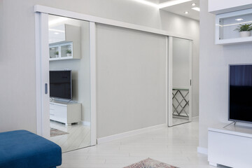 Modern Living Room with Sliding Doors and Minimalist Decor