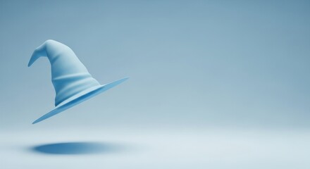 Obraz premium Floating blue wizard hat with soft shadows, perfect for Halloween marketing needs