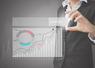 Businesswoman's hands searching for information growth graphs of financial indicator and accounting market economy analysis chart, business strategy concept.
