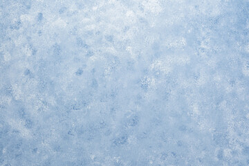 Light blue wall texture with soft mottled pattern and plaster effect