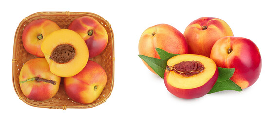 Ripe nectarine fruit with half in a wicker basket isolated on white background with full depth of field. Top view. Flat lay