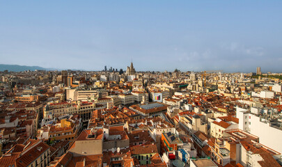 Aerial view of the Cuatro Torres Business Area skyscrapers in Madrid, Spain, at sunset