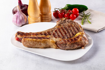 Grilled ribeye beef steak with bone