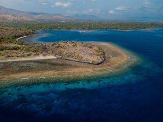 Naklejka premium Landscape on West Bali with blue ocean and mountains in Pemuteran. Drone view