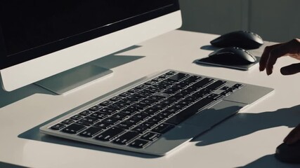computer input keyboard and pointing mouse device positioned on workstation surface in office environment