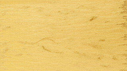 Golden plaster wall texture with subtle cracks and rough surface, elegant abstract background for luxury, festive, and decorative design.