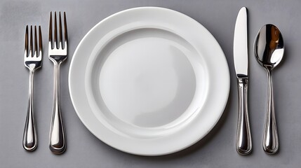 Minimalist Table Setting with Empty White Plate and Silver Cutlery on Gray Background