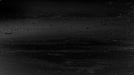 Black silk fabric texture with smooth folds and shiny surface, elegant luxury background for design and decoration.