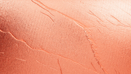 Red plaster wall texture with subtle cracks and rough surface, rustic abstract background for design, art, and decoration.