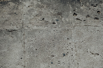 Textured concrete wall with pitting for concept of architectural surface detail