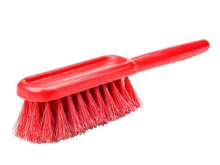 Red cleaning brush with plastic handle isolated on black background