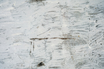 Weathered concrete wall with scratches for urban grunge background and industrial design concept