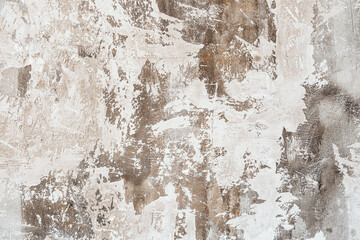 Textured wall with earthy tones showcasing unique patterns and layers